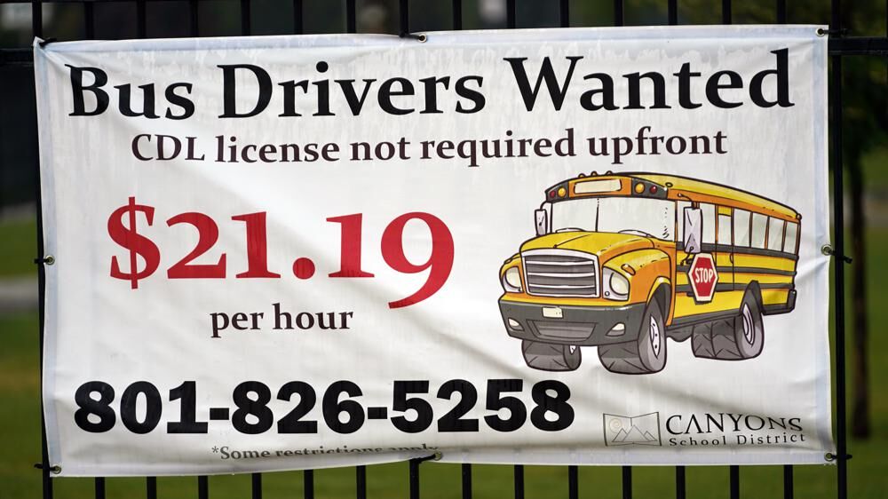A “Bus Drivers Wanted” sign